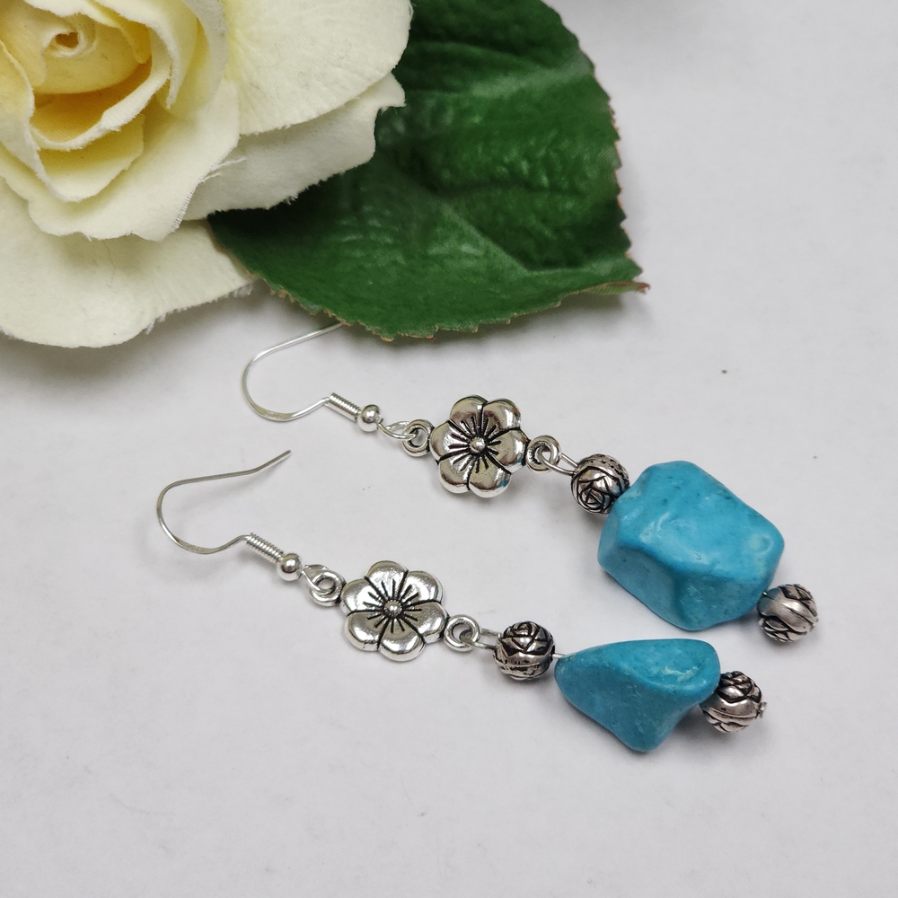 Dangle Earrings With Faux Turquois & Silver Toned Flower Accents